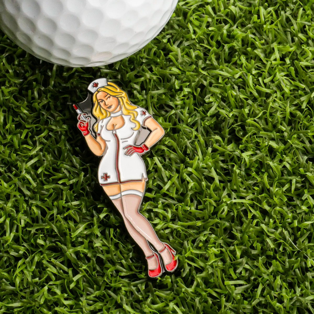 The Punk Rock Nurse Ball Marker by Ballmarkers.com features a cartoon nurse in a short white outfit and red heels holding a syringe—perfect for fun nurse golf accessories.