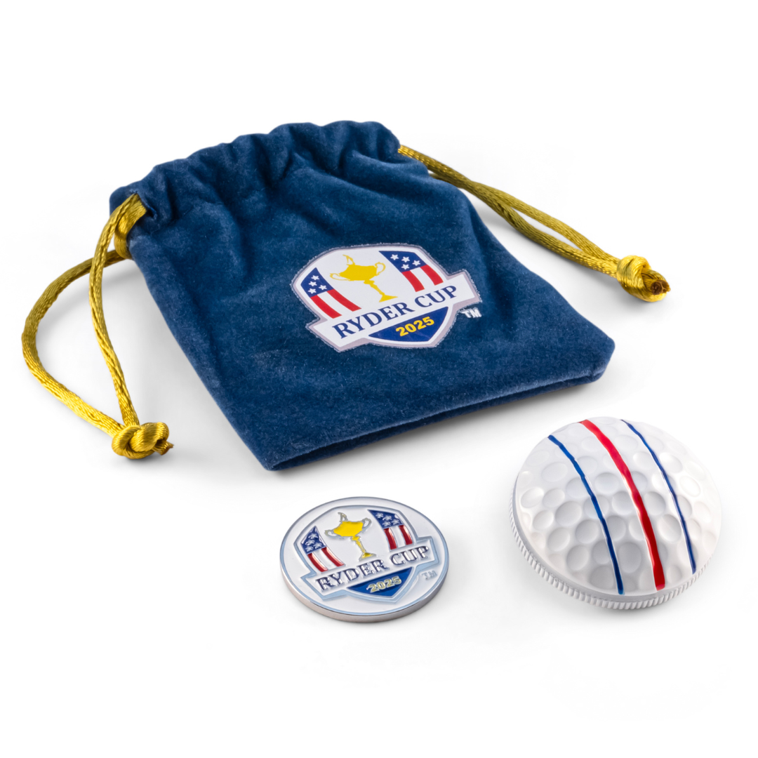 The OnPointGolf.us ON POINT 3D Ball Marker — Ryder Cup Edition features a blue drawstring pouch with the 2025 Ryder Cup logo, a round Ryder Cup ball marker, and a golf ball-shaped accent with red and blue stripes, all on a white background.
