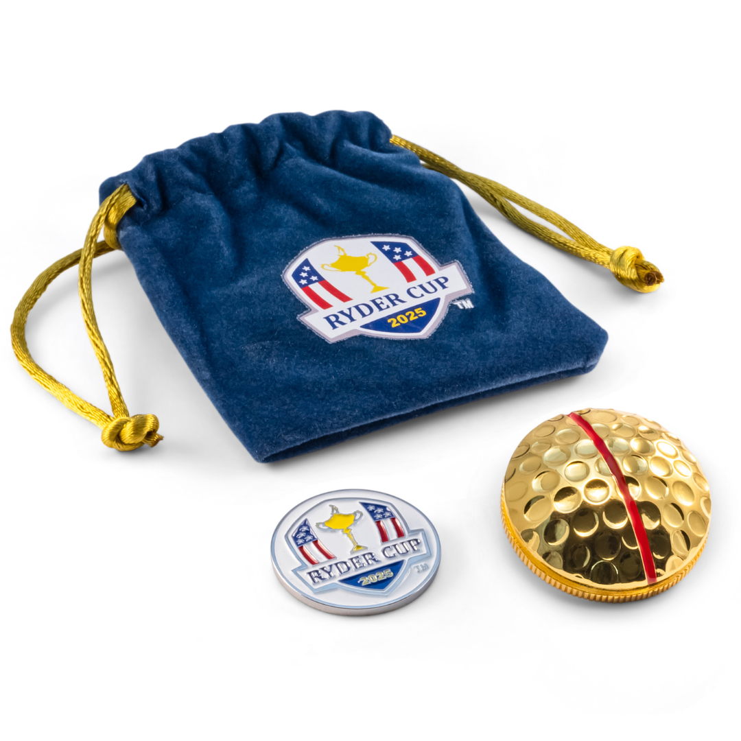 A blue velvet Ryder Cup 2025 drawstring pouch with a gold cord, a gold golf ball with a red stripe, the ON POINT 3D Ball Marker — Ryder Cup Edition by OnPointGolf.us, and a round logo coin are shown on a white background.