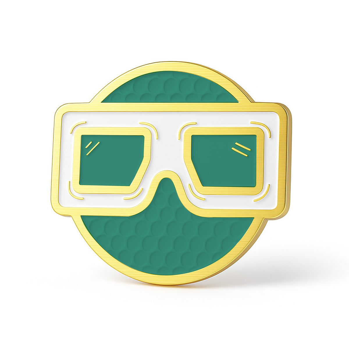 THE BLURRD PREMIUM BALL MARKER by BLURRD is a round, green pin with a gold border and white and gold glasses at the center. Its bold, graphic design and subtle textured background make it a stylish golf accessory.