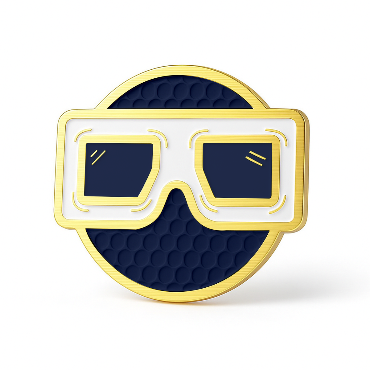 THE BLURRD PREMIUM BALL MARKER by BLURRD is a gold-rimmed, circular magnetic ball marker with a textured dark blue background and a stylish white and gold glasses design—an ideal golf accessory.