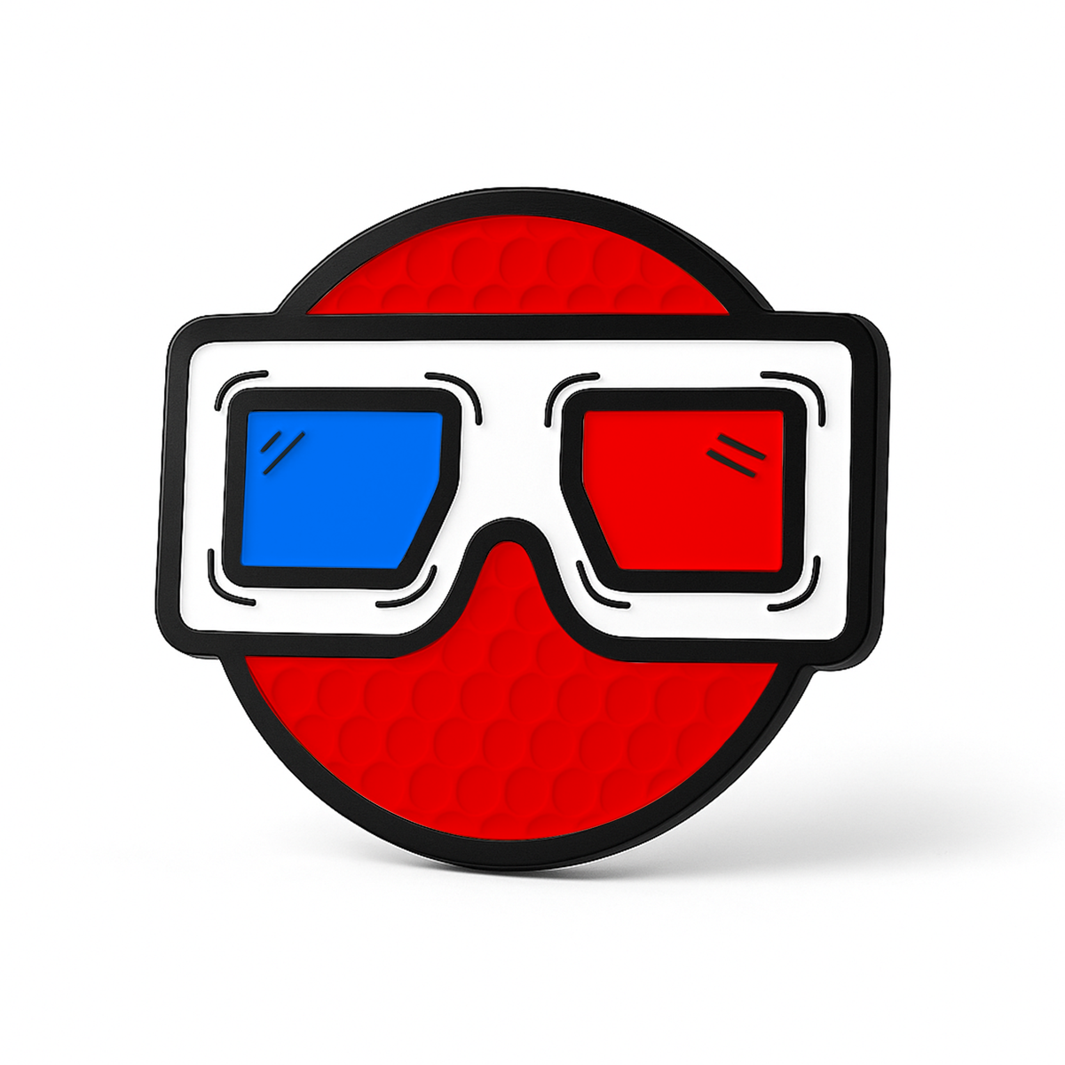 THE BLURRD PREMIUM BALL MARKER by BLURRD features a red circular design with a textured pattern and white 3D glasses—blue left lens, red right lens. A stylish magnetic golf accessory on a white background.
