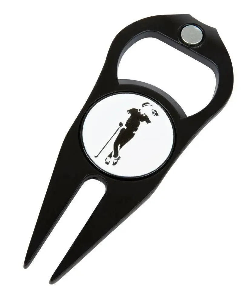 The Grunk Divot Tool by Grunk Dolfer is a black metal tool with two prongs, a magnetized ball marker at the top, and a center emblem featuring a golfer’s silhouette mid-swing.