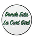 The Grunk Dolfer Donde Esta Ball Marker is a round, white marker with green cursive "Donde Esta La Cart Girl" text outlined in black. It offers a strong magnetic hold, combining secure and stylish use on the course.