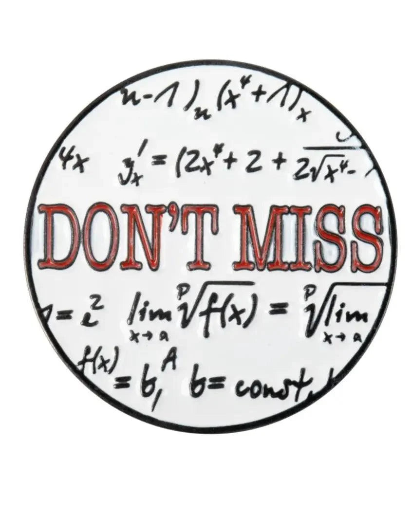 The Grunk Dolfer Don't Miss Ball Marker features bold red "DONT MISS" text and math symbols. This unique circular golf gift easily attaches to your cap using its magnetic hat clip.